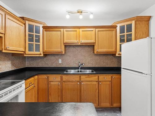 10814 51 Avenue, Edmonton, AB - Indoor Photo Showing Kitchen With Double Sink