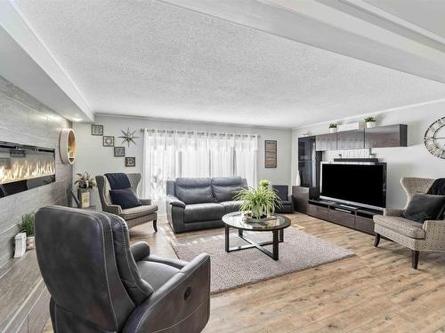 2 8516 Hwy 16, Rural Yellowhead, AB - Indoor Photo Showing Living Room With Fireplace