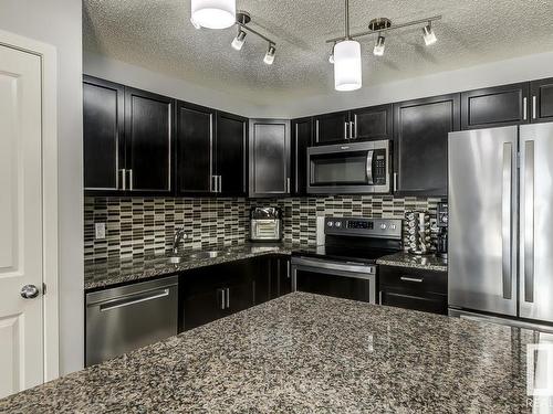 35 3305 Orchards Link Link, Edmonton, AB - Indoor Photo Showing Kitchen With Stainless Steel Kitchen With Upgraded Kitchen