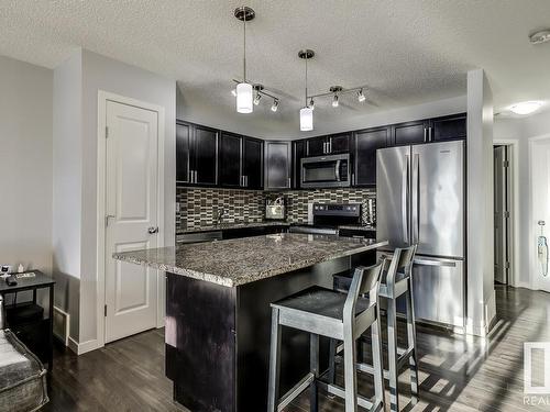 35 3305 Orchards Link Link, Edmonton, AB - Indoor Photo Showing Kitchen With Stainless Steel Kitchen With Upgraded Kitchen