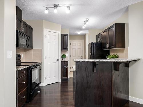 6006 Sunbrook Landing, Sherwood Park, AB - Indoor Photo Showing Kitchen With Upgraded Kitchen