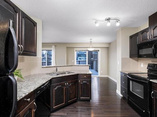 6006 Sunbrook Landing, Sherwood Park, AB - Indoor Photo Showing Kitchen With Double Sink