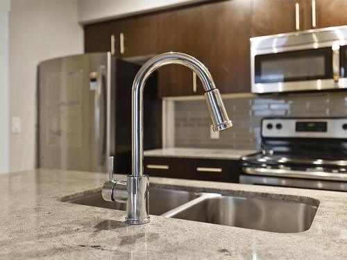 905 10226 104 Street, Edmonton, AB - Indoor Photo Showing Kitchen With Stainless Steel Kitchen With Double Sink With Upgraded Kitchen