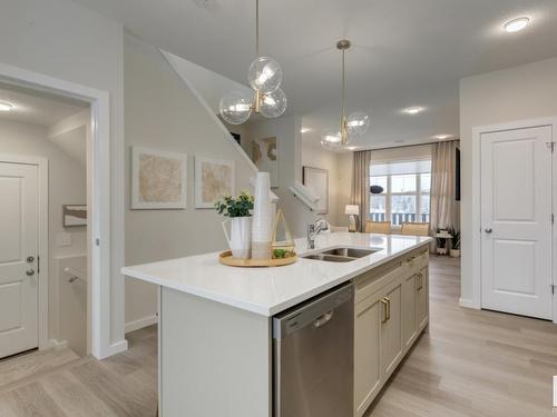 728 Southfork Drive, Leduc, AB - Indoor Photo Showing Kitchen With Double Sink