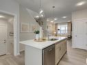 728 Southfork Drive, Leduc, AB  - Indoor Photo Showing Kitchen With Double Sink 