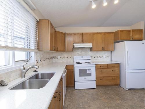 78 Highwood Bay, Devon, AB - Indoor Photo Showing Kitchen With Double Sink