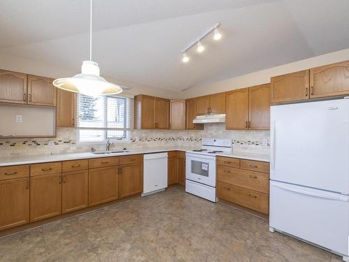 78 Highwood Bay, Devon, AB - Indoor Photo Showing Kitchen With Double Sink