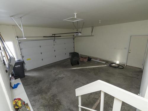 78 Highwood Bay, Devon, AB - Indoor Photo Showing Garage