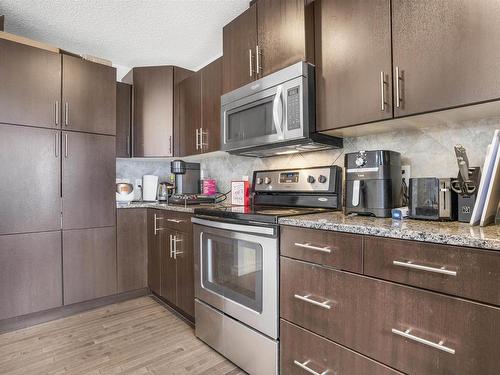 113 3625 144 Avenue, Edmonton, AB - Indoor Photo Showing Kitchen With Stainless Steel Kitchen