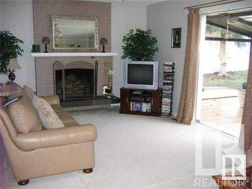 13312 Buena Vista Road, Edmonton, AB - Indoor Photo Showing Living Room With Fireplace