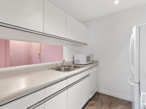 424 2520 50 Street, Edmonton, AB - Indoor Photo Showing Kitchen With Double Sink