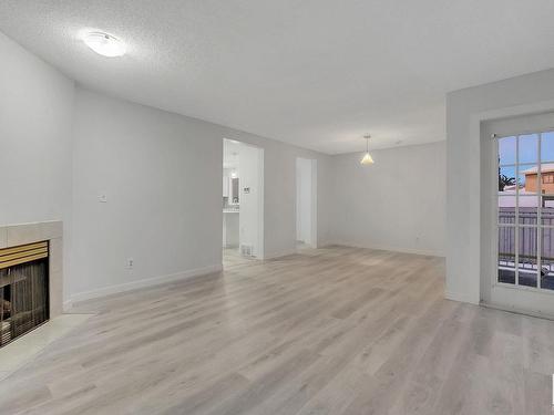 15 14717 34 Street Nw, Edmonton, AB - Indoor With Fireplace