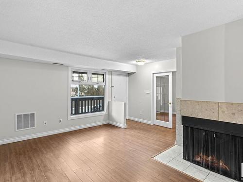 5914 172 Street, Edmonton, AB - Indoor Photo Showing Living Room With Fireplace