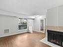 5914 172 Street, Edmonton, AB  - Indoor Photo Showing Living Room With Fireplace 