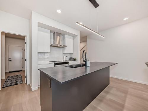 412 33 Street Sw, Edmonton, AB - Indoor Photo Showing Kitchen With Double Sink