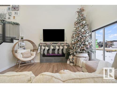 6032 King Landing, Edmonton, AB - Indoor Photo Showing Living Room With Fireplace