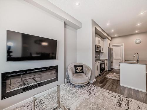 3234 Kulay Way, Edmonton, AB - Indoor Photo Showing Other Room With Fireplace