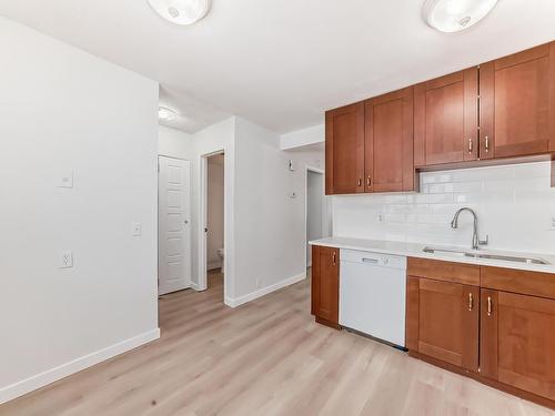 14625 55 Street, Edmonton, AB - Indoor Photo Showing Kitchen With Double Sink