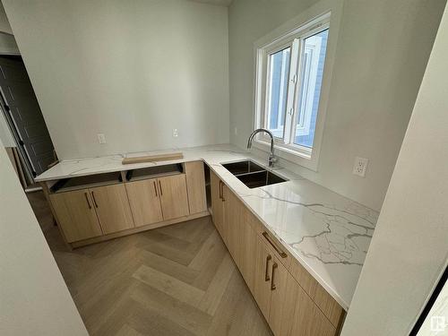 17 Baker Street, Ardrossan, AB - Indoor Photo Showing Kitchen With Double Sink