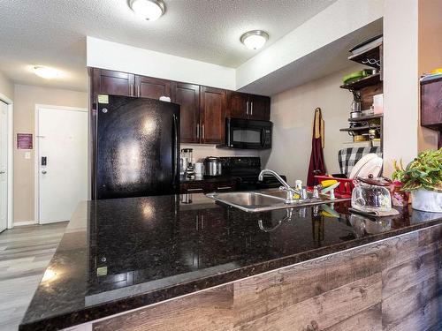 117 11804 22 Avenue, Edmonton, AB - Indoor Photo Showing Kitchen With Double Sink