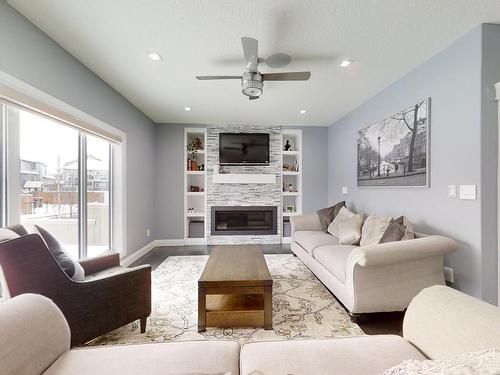 1966 Adamson Terrace Sw, Edmonton, AB - Indoor Photo Showing Living Room With Fireplace