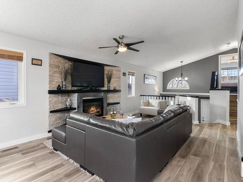 3772 20 Street, Edmonton, AB - Indoor Photo Showing Living Room With Fireplace