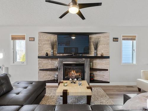 3772 20 Street, Edmonton, AB - Indoor Photo Showing Living Room With Fireplace