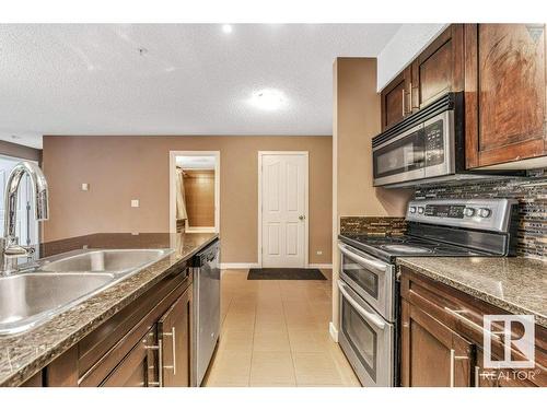 203 534 Watt Boulevard, Edmonton, AB - Indoor Photo Showing Kitchen With Stainless Steel Kitchen With Double Sink