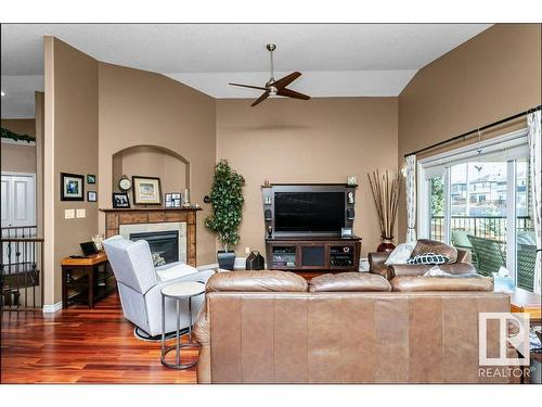 81 Walters Place, Leduc, AB - Indoor Photo Showing Living Room With Fireplace