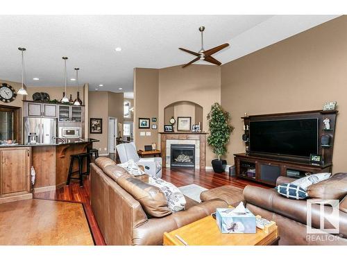 81 Walters Place, Leduc, AB - Indoor Photo Showing Living Room With Fireplace