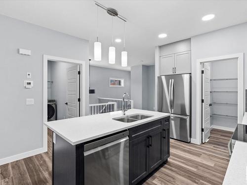 26 Ashbury Crescent, Spruce Grove, AB - Indoor Photo Showing Kitchen With Double Sink