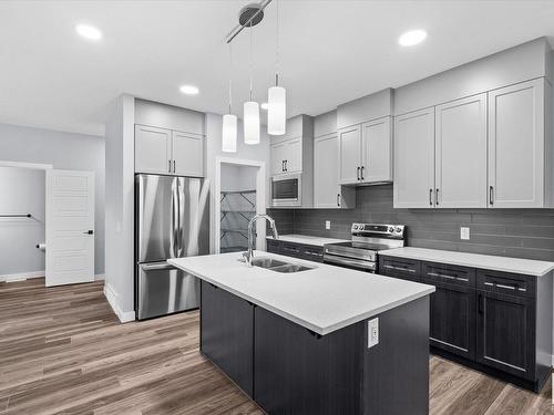 26 Ashbury Crescent, Spruce Grove, AB - Indoor Photo Showing Kitchen With Double Sink With Upgraded Kitchen