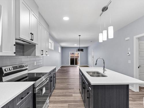 26 Ashbury Crescent, Spruce Grove, AB - Indoor Photo Showing Kitchen With Double Sink With Upgraded Kitchen