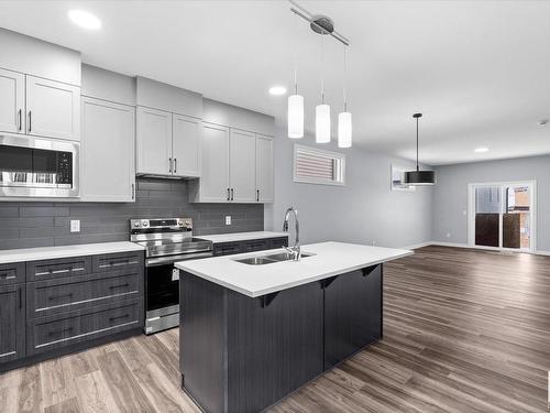 26 Ashbury Crescent, Spruce Grove, AB - Indoor Photo Showing Kitchen With Double Sink With Upgraded Kitchen