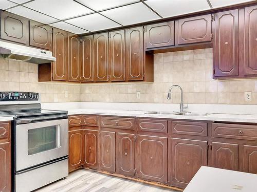 6807 12 Avenue, Edmonton, AB - Indoor Photo Showing Kitchen With Double Sink