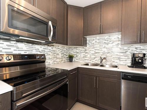 8 4850 Terwillegar Common, Edmonton, AB - Indoor Photo Showing Kitchen With Stainless Steel Kitchen With Double Sink With Upgraded Kitchen