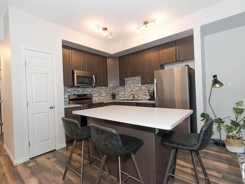 8 4850 Terwillegar Common, Edmonton, AB - Indoor Photo Showing Kitchen With Stainless Steel Kitchen With Upgraded Kitchen