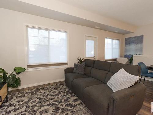 8 4850 Terwillegar Common, Edmonton, AB - Indoor Photo Showing Living Room