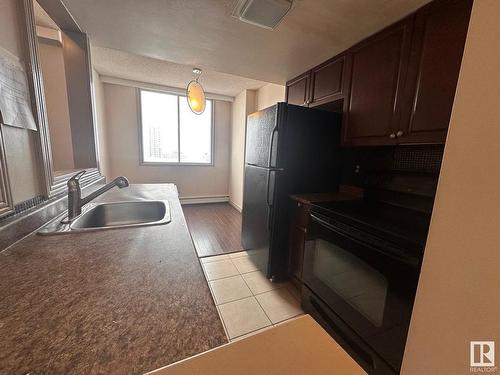 2101 9909 104 Street, Edmonton, AB - Indoor Photo Showing Kitchen With Double Sink