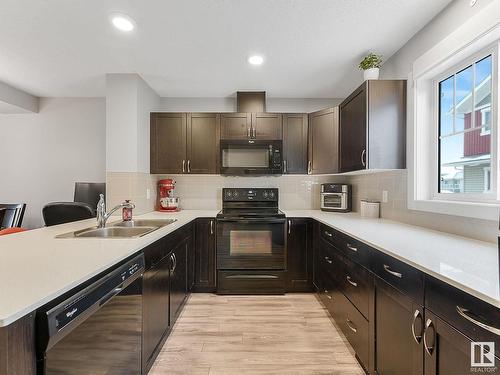 109 17832 78 Street, Edmonton, AB - Indoor Photo Showing Kitchen With Double Sink