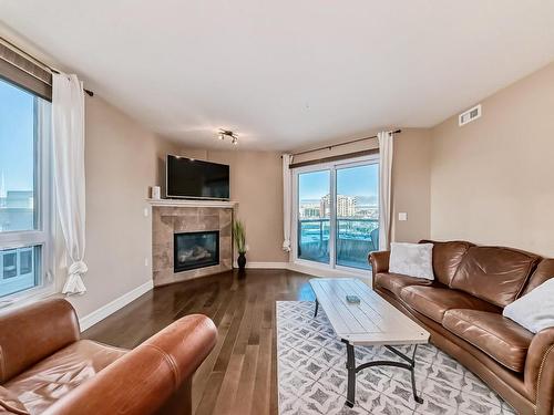 510 10142 111 Street, Edmonton, AB - Indoor Photo Showing Living Room With Fireplace