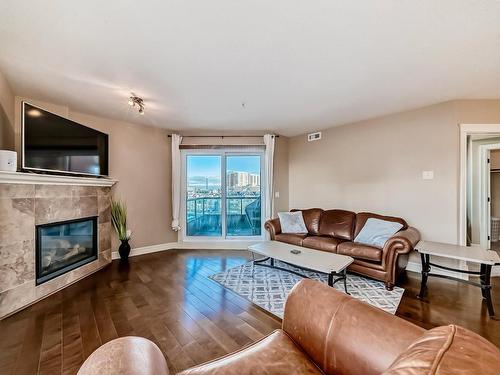 510 10142 111 Street, Edmonton, AB - Indoor Photo Showing Living Room With Fireplace