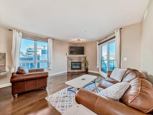 510 10142 111 Street, Edmonton, AB - Indoor Photo Showing Living Room With Fireplace