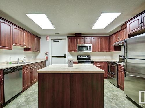 510 10142 111 Street, Edmonton, AB - Indoor Photo Showing Kitchen With Stainless Steel Kitchen With Double Sink