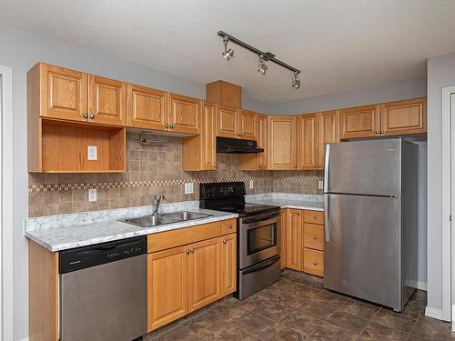 424 5005 165 Avenue, Edmonton, AB - Indoor Photo Showing Kitchen With Double Sink