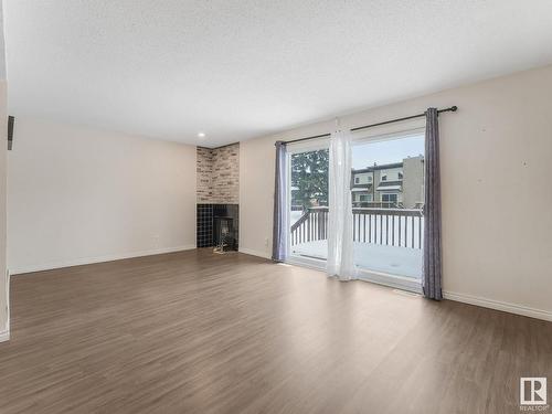 14656 121 Street, Edmonton, AB - Indoor Photo Showing Living Room With Fireplace