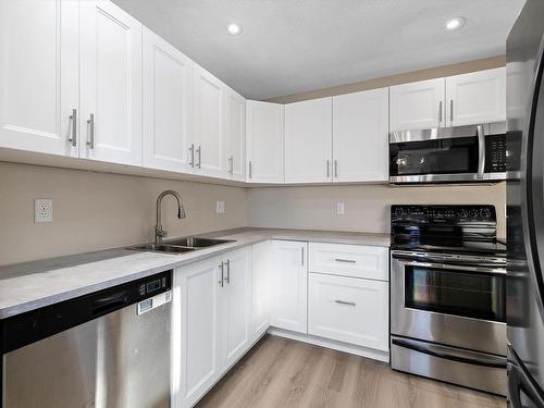 5 Warwick Road, Edmonton, AB - Indoor Photo Showing Kitchen With Stainless Steel Kitchen With Double Sink