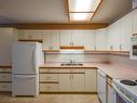 206 112 Church Road, Spruce Grove, AB  - Indoor Photo Showing Kitchen With Double Sink 