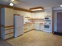 206 112 Church Road, Spruce Grove, AB  - Indoor Photo Showing Kitchen With Double Sink 