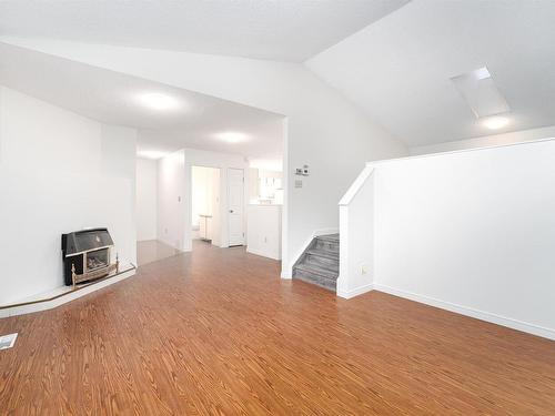 27 4630 17 Avenue, Edmonton, AB - Indoor Photo Showing Other Room With Fireplace